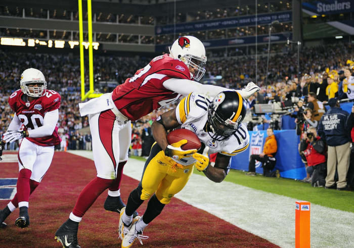 2009-0201-Super-Bowl-XLIII-Santonio-Holmes-Aaron-Francisco-opgm-51894.jpg